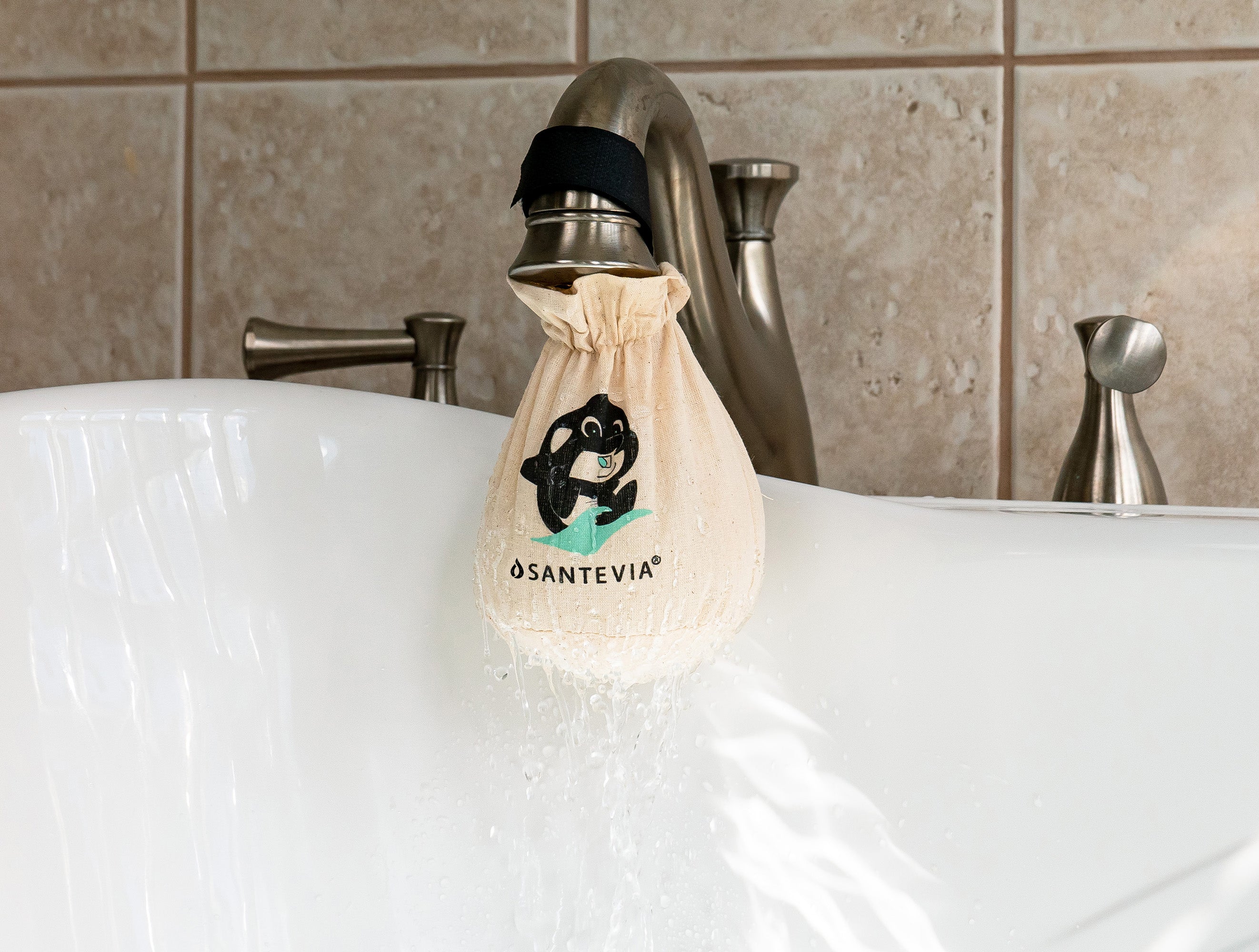 Santevia Bath Filter in a bath with nicely light bathroom
